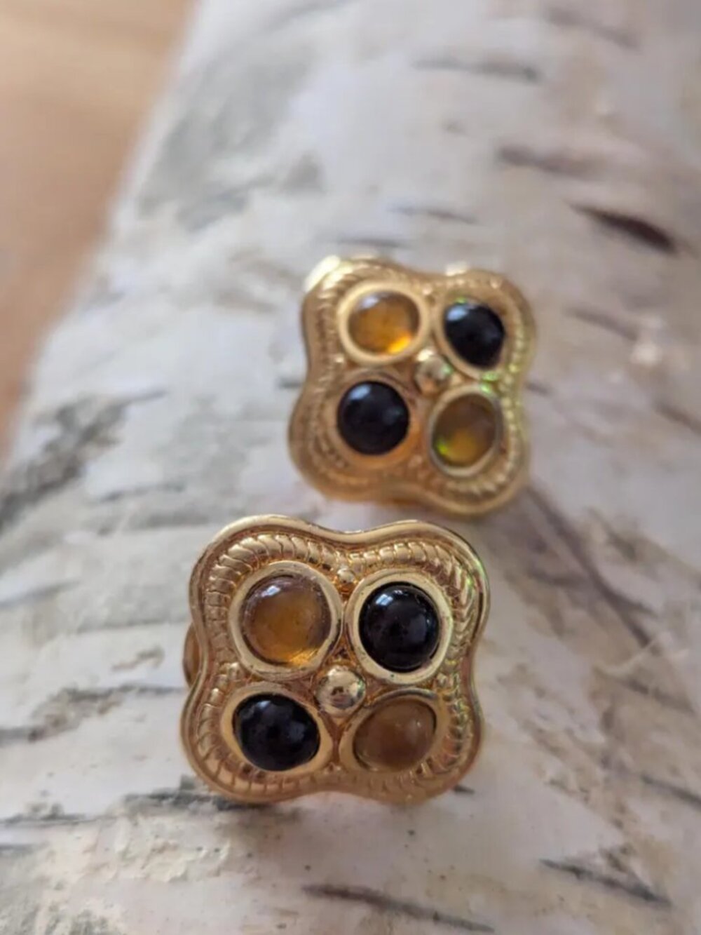 Vintage monet multi color gold tone clip on earrings. 3/4"